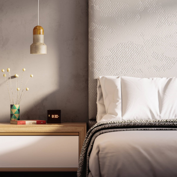 Grey bed and bedside table