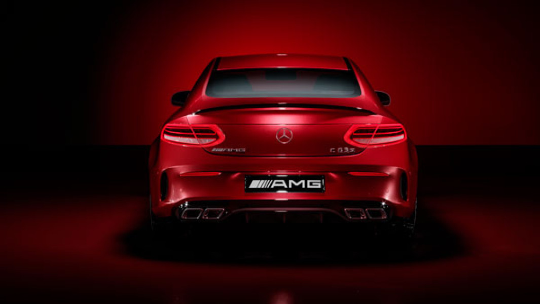 Back view of a red Mercedes Benz